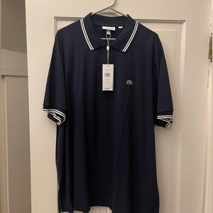 Men’s Polo by Lacoste.